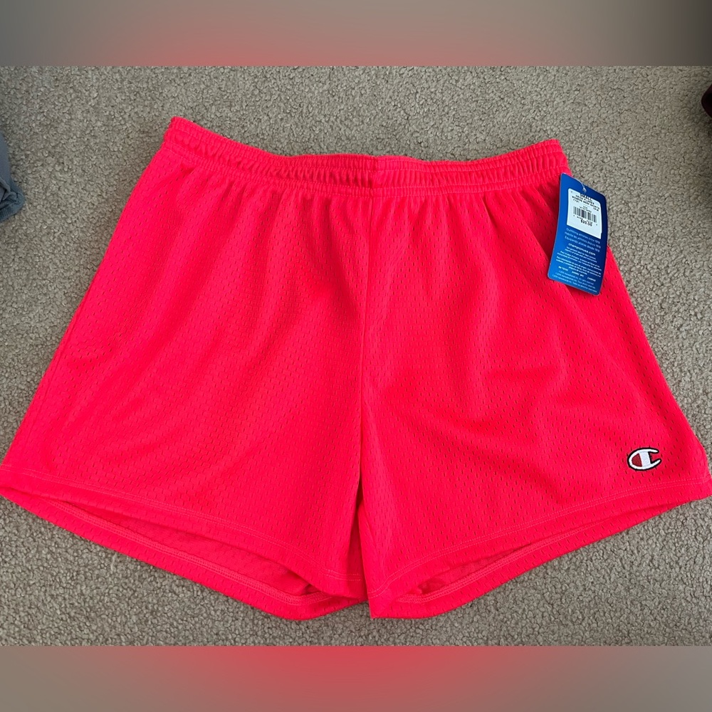 Neon pink champion shorts. New with tags!